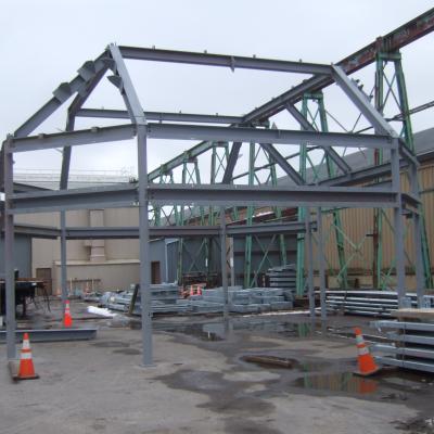 A large steal frame in an outdoor construction yard