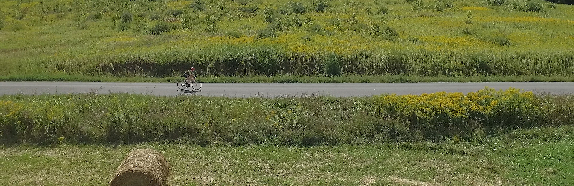 Katie Moring cycling through the hilss of ithaca