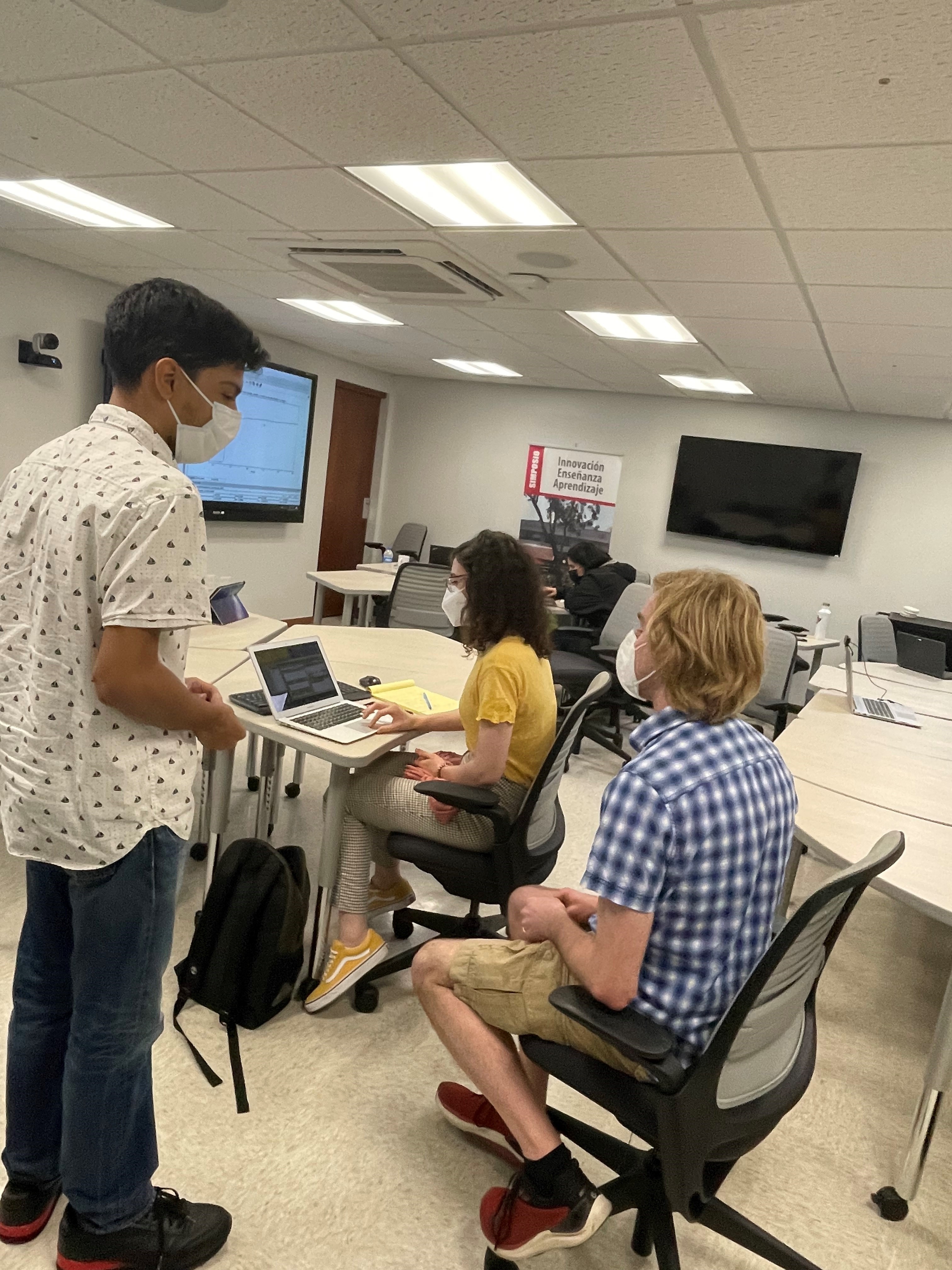 image of students working with a CHESS scientist