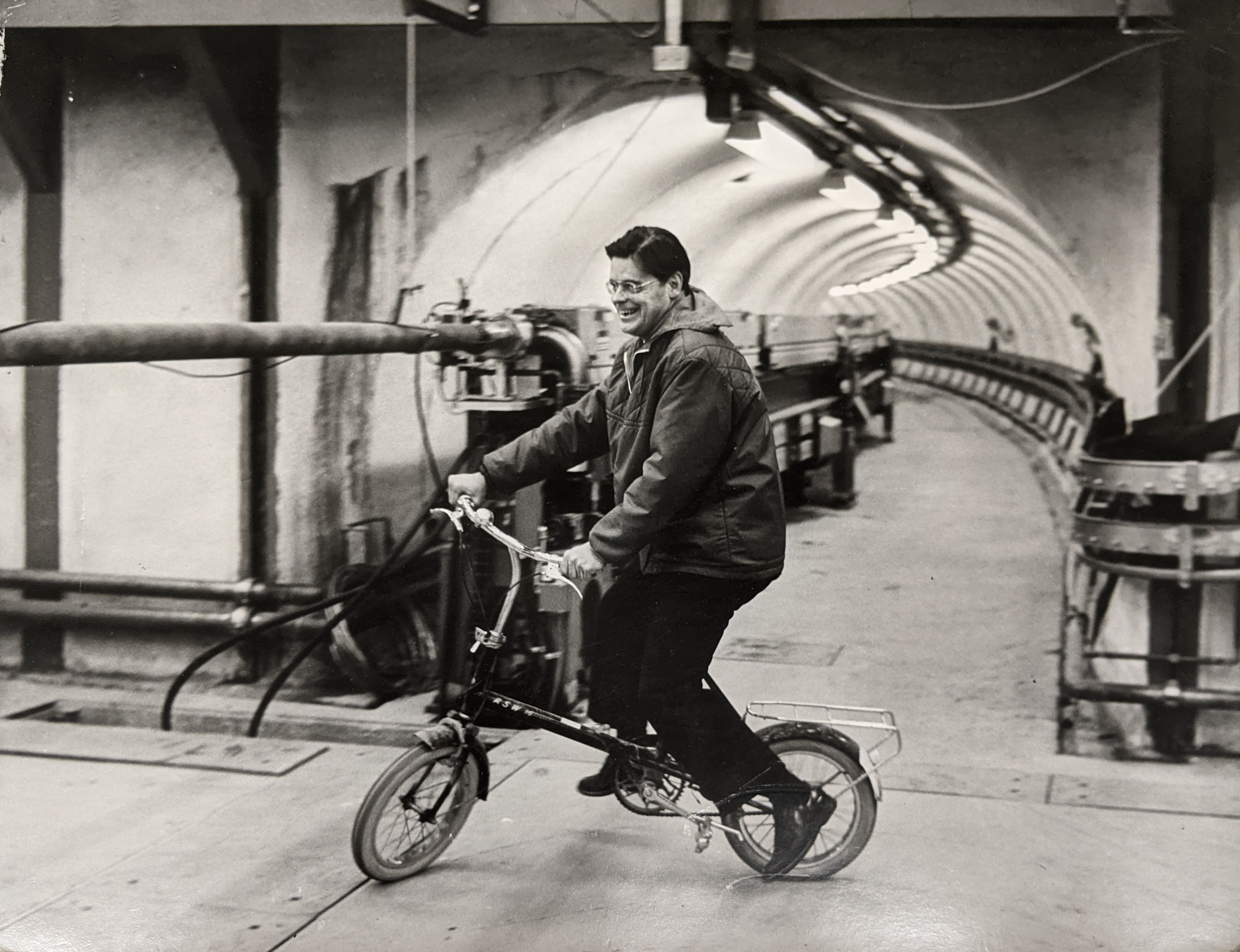 image of a man on a bike in a tunnel