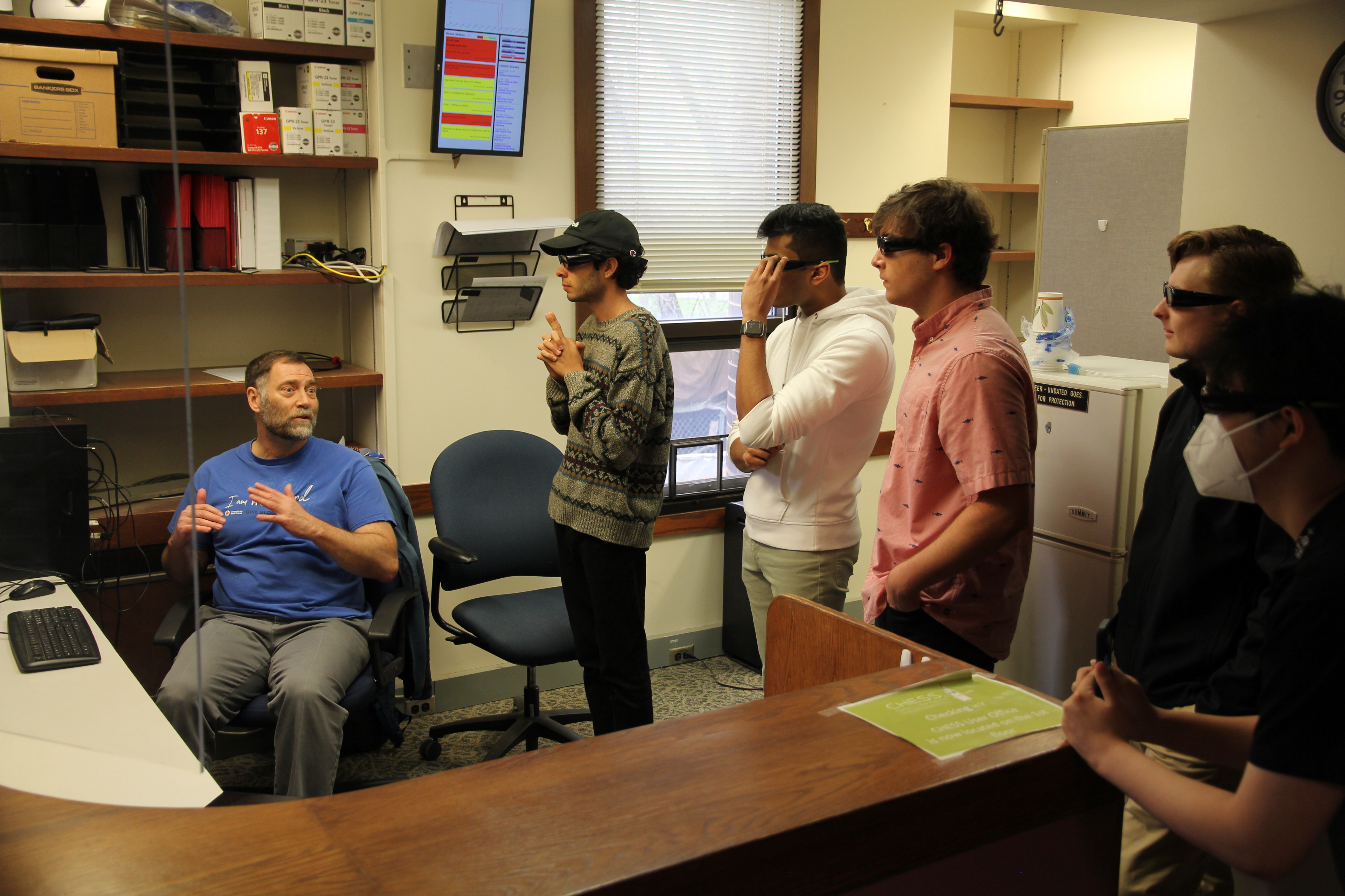 David Schuller shows students how 3D glasses are used to visualize protein structures in PyMOL