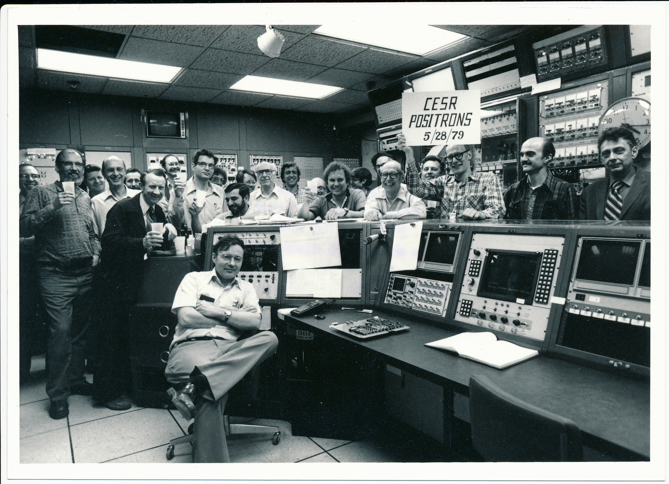 CESR Team celebrating positrons at Wilson Lab