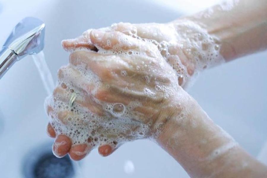 Women washing hands