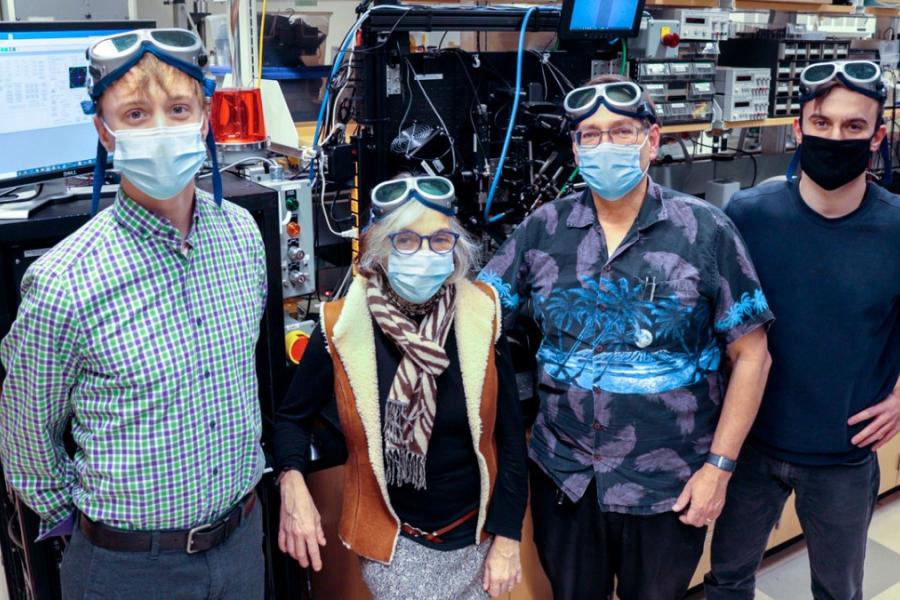 Image of a group of four researchers in a lab.