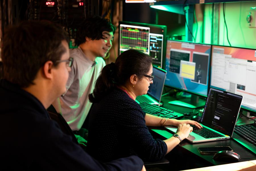 researchers at the beamline