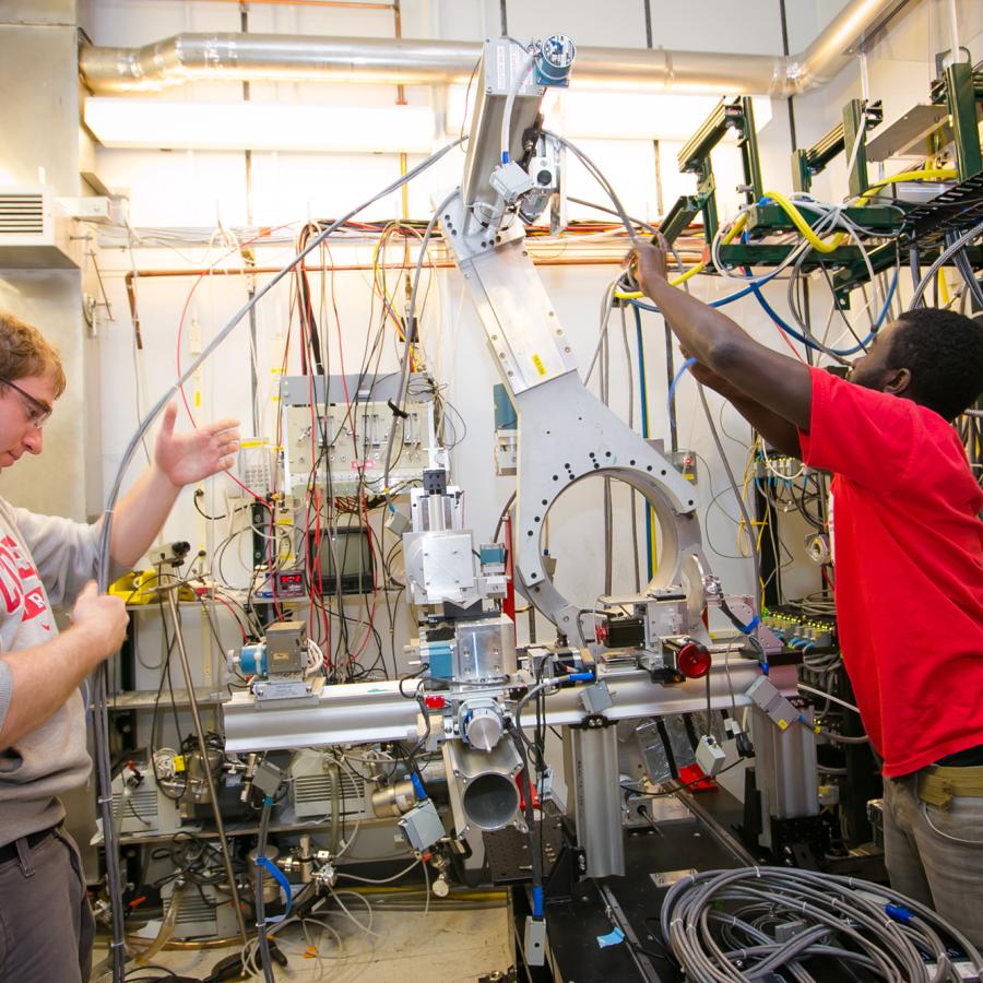 Graduate Students set up a beam line at CHESS