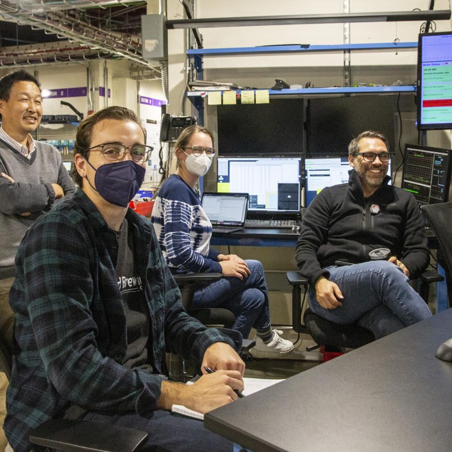 scientists at the beam line