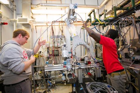 Graduate Students set up a beam line at CHESS