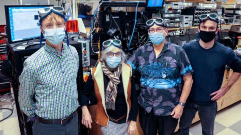 Image of a group of four researchers in a lab.