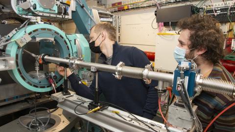 Image of two scientist at a CHESS beamline