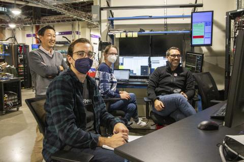 scientists at the beam line