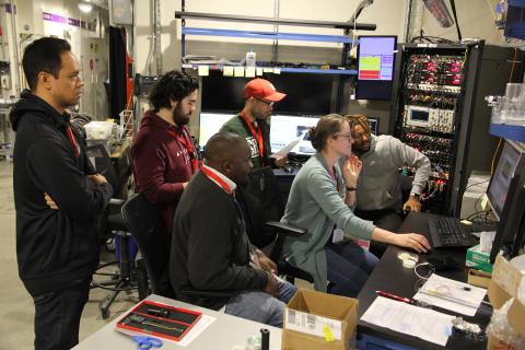 students at beamline