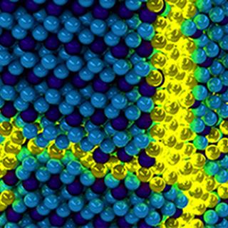 Artist's conception of charge density wave domain walls in TiSe2 and the emergence of superconductivity through their quantum fluctuations.