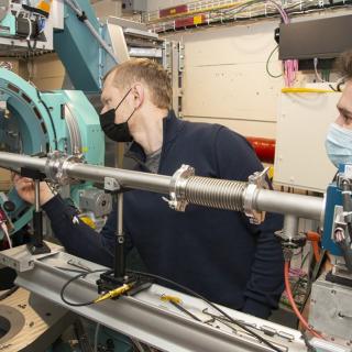 Image of two scientist at a CHESS beamline