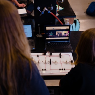 image of two students using a Foutan board