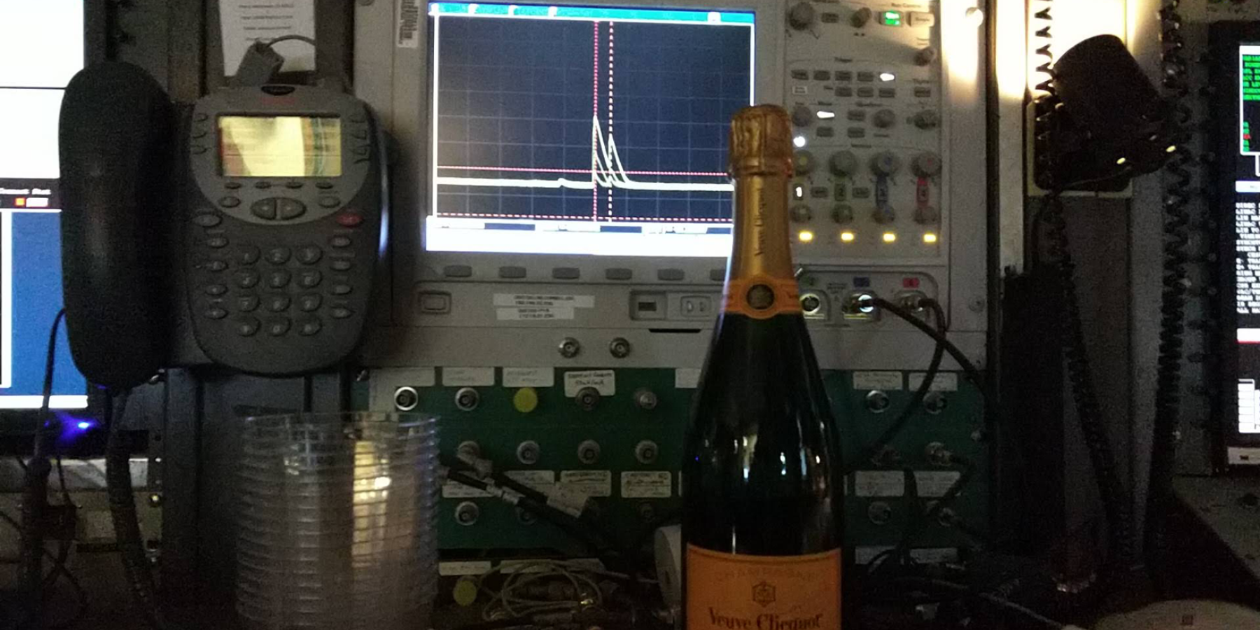 First Turn of Positrons at CESR-CHESS